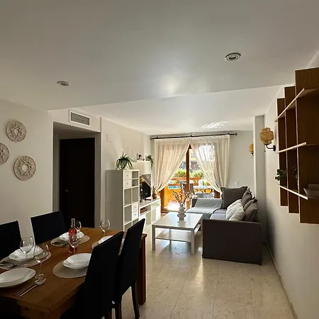 Appartement Ground Floor Punta Prima Looking At The Pool